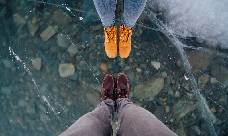 Two People standing on ice